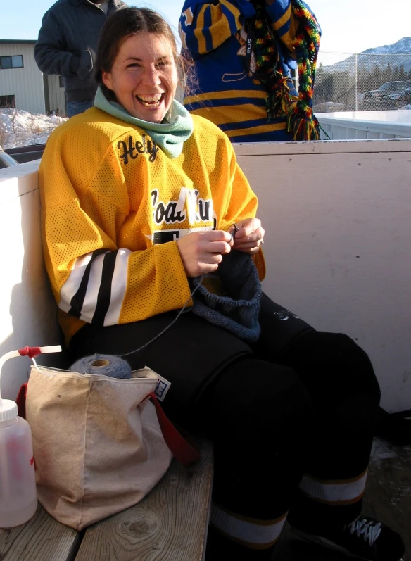 Carrie Cahill Mulligan knitting between hockey games, Healy, Alaska, February 2003.