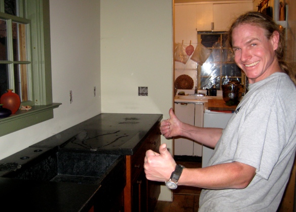 Andy is happy with the installation of his 1st-ever concrete counter top.