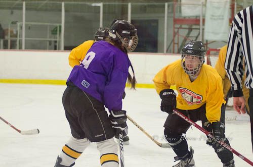 Carrie Cahill Mulligan of team Deep Purple squares off against Rob Callow of the Screaming Eagles, Campion Hockey League (CHL), Lebanon, New Hampshire.