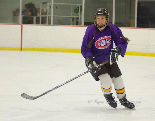 Carrie Cahill Mulligan skates with team Deep Purple in the 2012 Campion Hockey League, near Hanover, NH. 