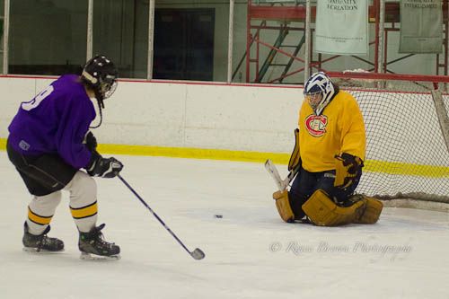 Carrie Cahill Mulligan of team Deep Purple rushes the net to support the puck in the 2013 Campion Hockey League, near Hanover, New Hampshire.