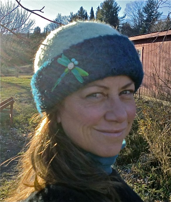 Glass artist, Wendy Besett, of Hardwick, VT in her latest Carrie Cahill Mulligan felt hat, with dragonfly embroidery.