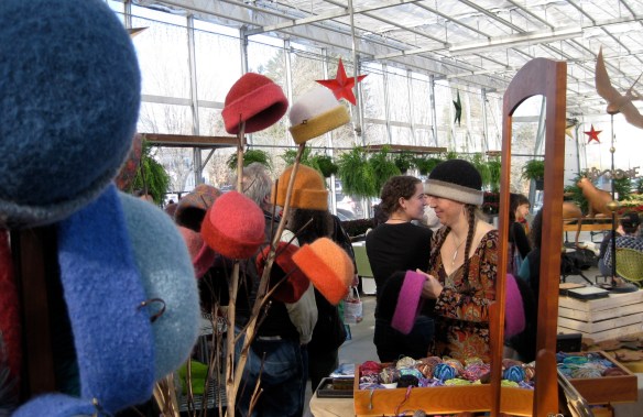 Such great lighting in the new greenhouse... really shows off the hats!